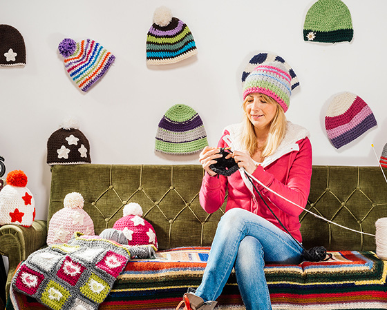 woman knitting a hat