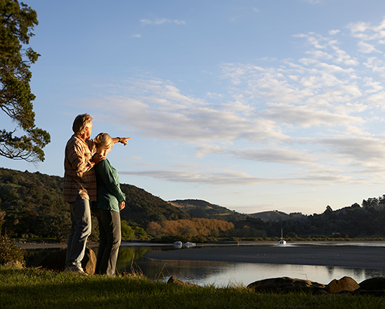 retired couple overlooking lake