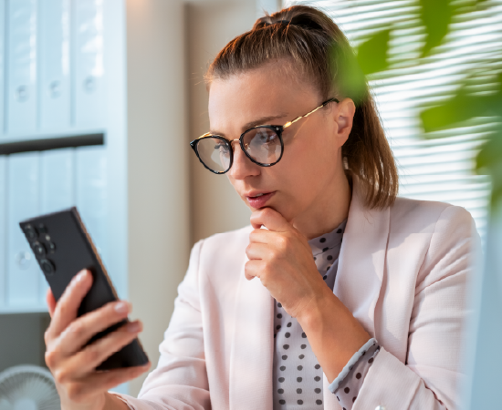 Woman examines fraud threat.