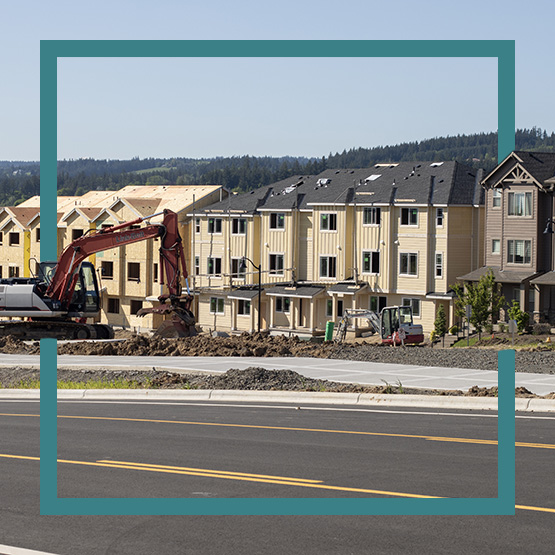 Construction on new apartment building with teal border
